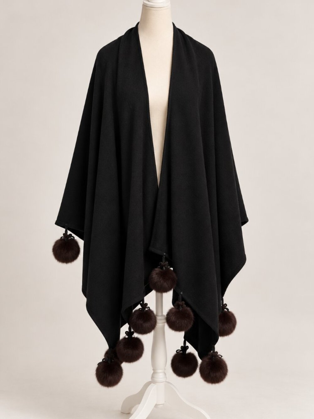 Elegant black draped wool cape/ruana with an open front, asymmetrical hem and m